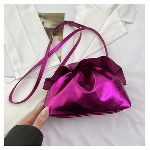 Detailed view of the metallic purple pleated cloud bag with shiny PU leather texture