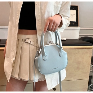 Light blue PU leather doctor bag with metal clasp and twin handles for women