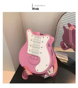 Detailed view of pink guitar-shaped PU shoulder bag with decorative strings and strap