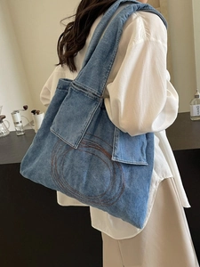 Classic blue denim tote bag for women with large capacity and circular stitching detail