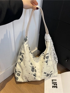 Grand sac fourre-tout en toile à motif floral avec bandoulière en cuir élégante