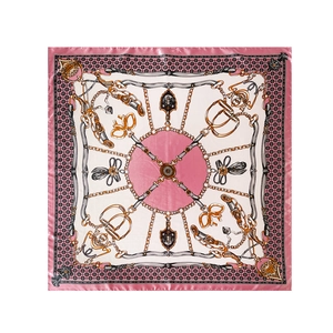 Close-up of elegant satin scarf with classic gold chain and equestrian motifs