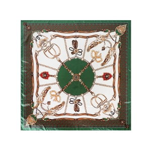 Detailed pattern of a square satin scarf with classic equestrian chain and stirrup print