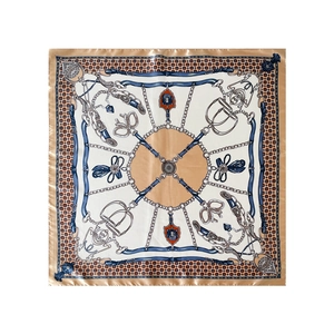 Detailed close-up of champagne silk scarf with vintage equestrian chain and bit print