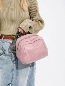 Rosa PU-Leder Beuteltasche mit Mehrschicht-Reißverschlüssen und ethnischem Jacquard-Gurt