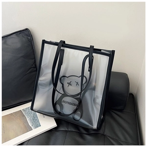 Detail showing the semi-transparent frosted PVC material and durable black leather handles