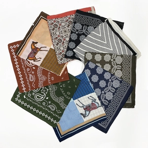 Collection of retro silk square scarves featuring classic equestrian and paisley patterns