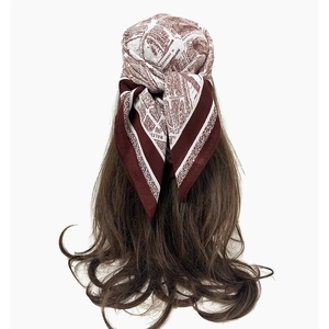 Close-up of vintage Paris city map pattern on deep red and ivory silk square scarf