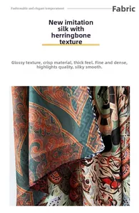 Detail of silk-like herringbone fabric showing vintage paisley patterns and rich texture