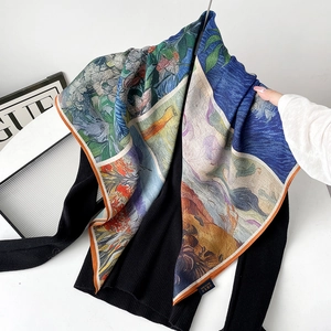 Close-up of silk wool blend scarf featuring artistic oil painting iris and starry sky patterns