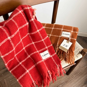 Thick plaid scarf for women featuring tassels in red and brown soft cashmere-like fabric