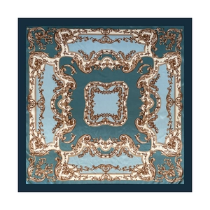 Peacock green satin silk scarf with gold baroque floral patterns in flat lay view