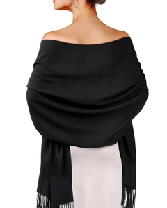 Elegant black pashmina shawl with tassel fringe showing drape and soft texture on model
