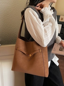 Retro large capacity brown leather bucket bag for women minimalist commuter shoulder bag