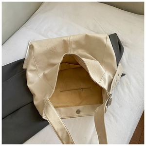 Top view of cream large tote bag showing interior lining zipper pocket and magnetic closure