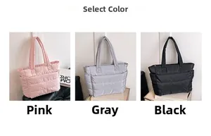 Quilted puffer tote bags displayed in pink, grey, and black with double wide straps