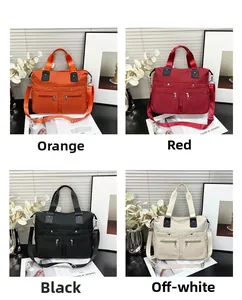 Sacs cabas en nylon orange rouge noir et beige avec fermetures éclair et bandoulière