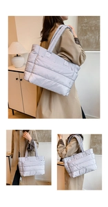 Detailed view of lightweight quilted nylon tote bag with spacious side pockets and soft straps