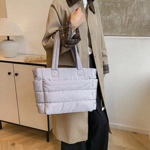 Minimalist lavender nylon quilted tote bag for women featuring a spacious lightweight design