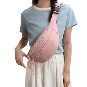 Pink nylon crescent crossbody bag for summer casual daily wear with adjustable strap