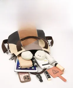 Internal view of large capacity canvas tote bag showing storage for tablet and gadgets