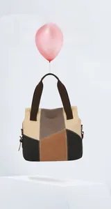 Creative display showing the lightweight canvas tote bag suspended by a balloon