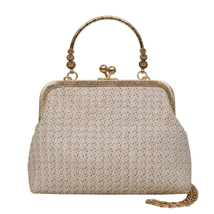 Retro straw shell bag with gold chain handle and floral hardware detail