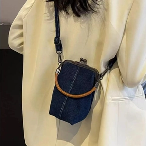 Retro denim crossbody kiss-lock bag with wooden handle and contrast stitching detail