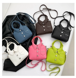 Detailed close-up of colorful shirt-shaped mini handbags with collar and button decor