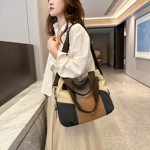 Retro canvas tote bag with multi-color patchwork and adjustable shoulder strap