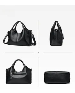 Detailed views of black pebble grain tote bag showing zipper pocket and straps