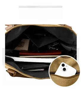 Detail view of large canvas tote bag showing interior compartments and zipper pockets