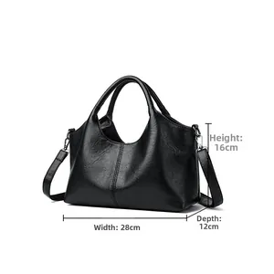 Detailed view of black PU leather tote bag showing 28cm width and 16cm height dimensions