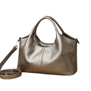 Metallic bronze tote bag for women with dual handles and adjustable shoulder strap