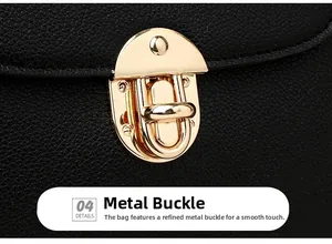 Detailed close-up of light gold hardware clasp on black lychee textured leather handbag