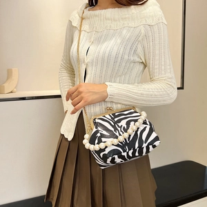Retro zebra print shoulder bag with pearl handle and golden chain strap for women