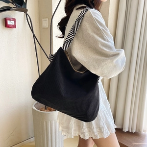 Large black corduroy tote bag for women with geometric pattern wide shoulder strap