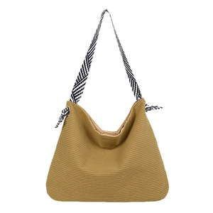 Retro mustard yellow corduroy tote bag with black and white striped shoulder strap