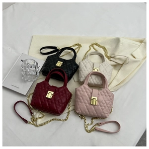 Detail showing four quilted lattice handbags in black, cream, burgundy, and pink finishes