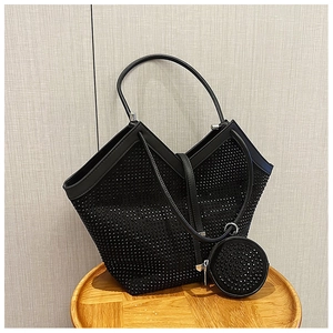 Detailed view of black rhinestone tote bag with a V-cut edge and matching mini coin purse