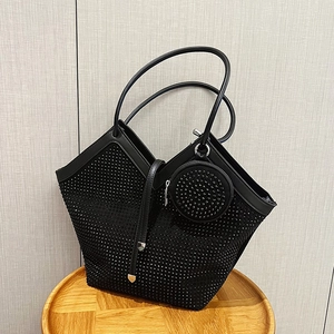 Chic black rhinestone tote bag with matching round coin purse and metal strap accents