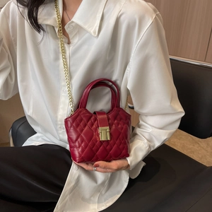 Deep red quilted small handbag with gold chain strap and elegant rhombic pattern finish
