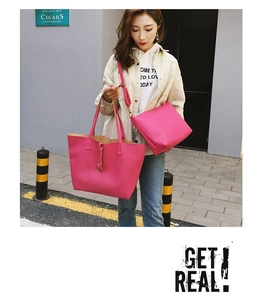 Close-up of pink litchi leather tote bag and crossbody set with high-quality metal buckles