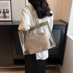 Chic transparent PVC tote bag with inner pouch and woven shoulder strap for beach
