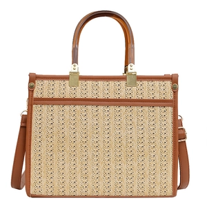 Retro straw tote bag with amber resin handles and brown leather trim for summer beach