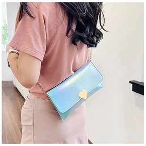 Detail of laser iridescent crossbody bag with heart buckle and gold chain strap