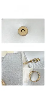Detailed macro view of silver glitter clutch bag featuring golden magnetic snap and metal chain
