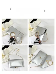 Detailed views of silver sequin envelope bag with golden metal handles and chain strap