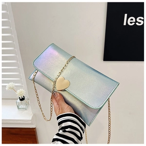 Iridescent light blue envelope clutch with gold heart-shaped metal buckle and chain strap