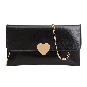Elegant black glossy leather envelope clutch bag with gold heart clasp and chain strap